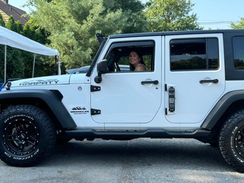 Used 2013 Jeep Wrangler Unlimited Sport image 1