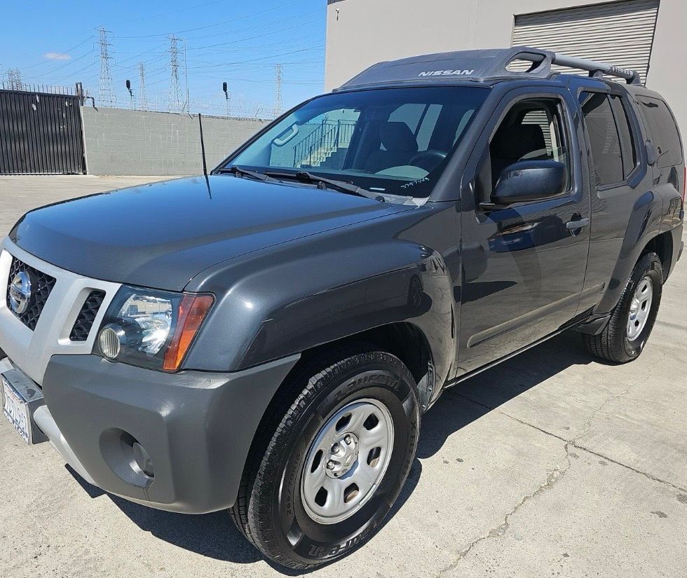 Used 2013 Nissan Xterra X RWD image 1