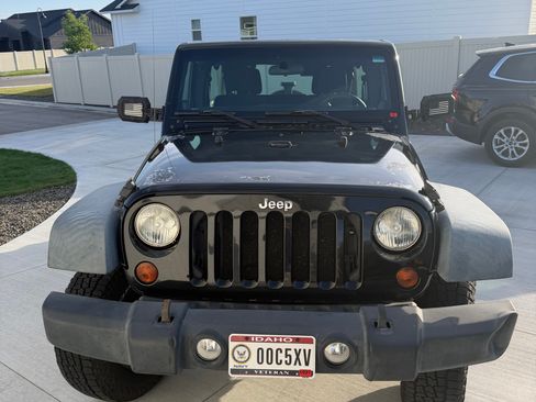 Used 2012 Jeep Wrangler Unlimited Sport AWD/4WD image 1