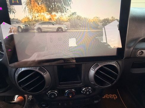 Used 2015 Jeep Wrangler Unlimited Sport w/ Connectivity Group AWD/4WD image 14