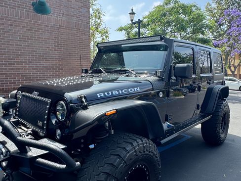Used 2013 Jeep Wrangler Unlimited Sport AWD/4WD image 2