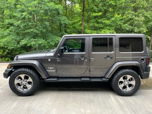 Used 2016 Jeep Wrangler Unlimited Sahara AWD/4WD image 1