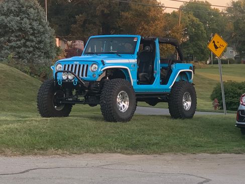 Used 2017 Jeep Wrangler Unlimited Sahara w/ Quick Order Package 23E Chief AWD/4WD image 1