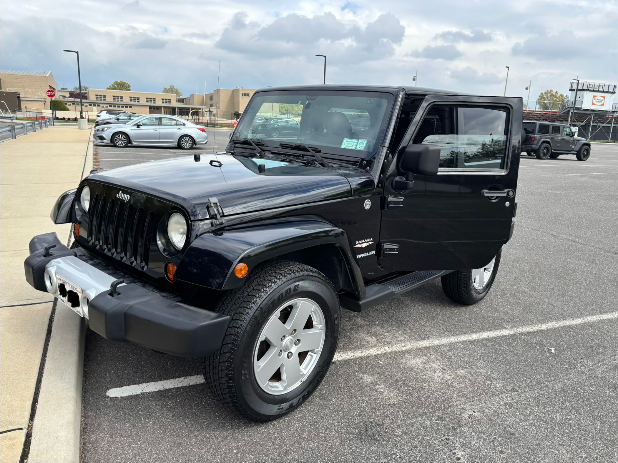 Used 2012 Jeep Wrangler Sahara w/ Dual Top Group AWD/4WD image 1