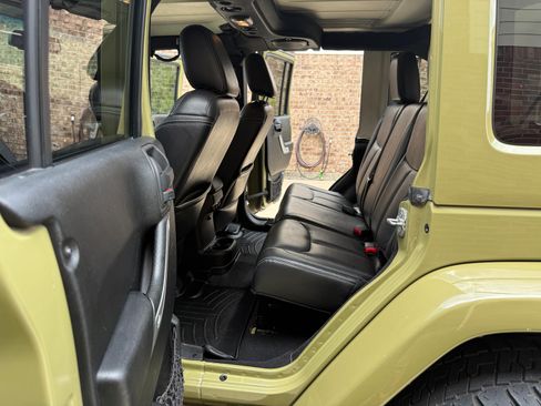 Used 2013 Jeep Wrangler Unlimited Sahara w/ Dual Top Group AWD/4WD image 11