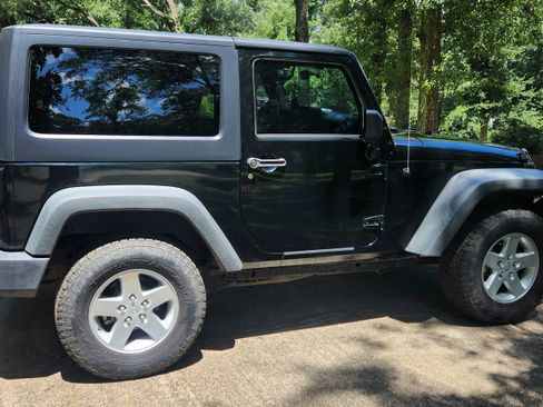 Used 2012 Jeep Wrangler Sport AWD/4WD image 1