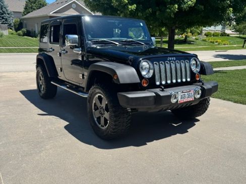 Used 2012 Jeep Wrangler Unlimited Sport AWD/4WD image 1
