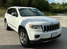 Used 2013 Jeep Grand Cherokee Limited w/ Luxury Group II AWD/4WD image 1