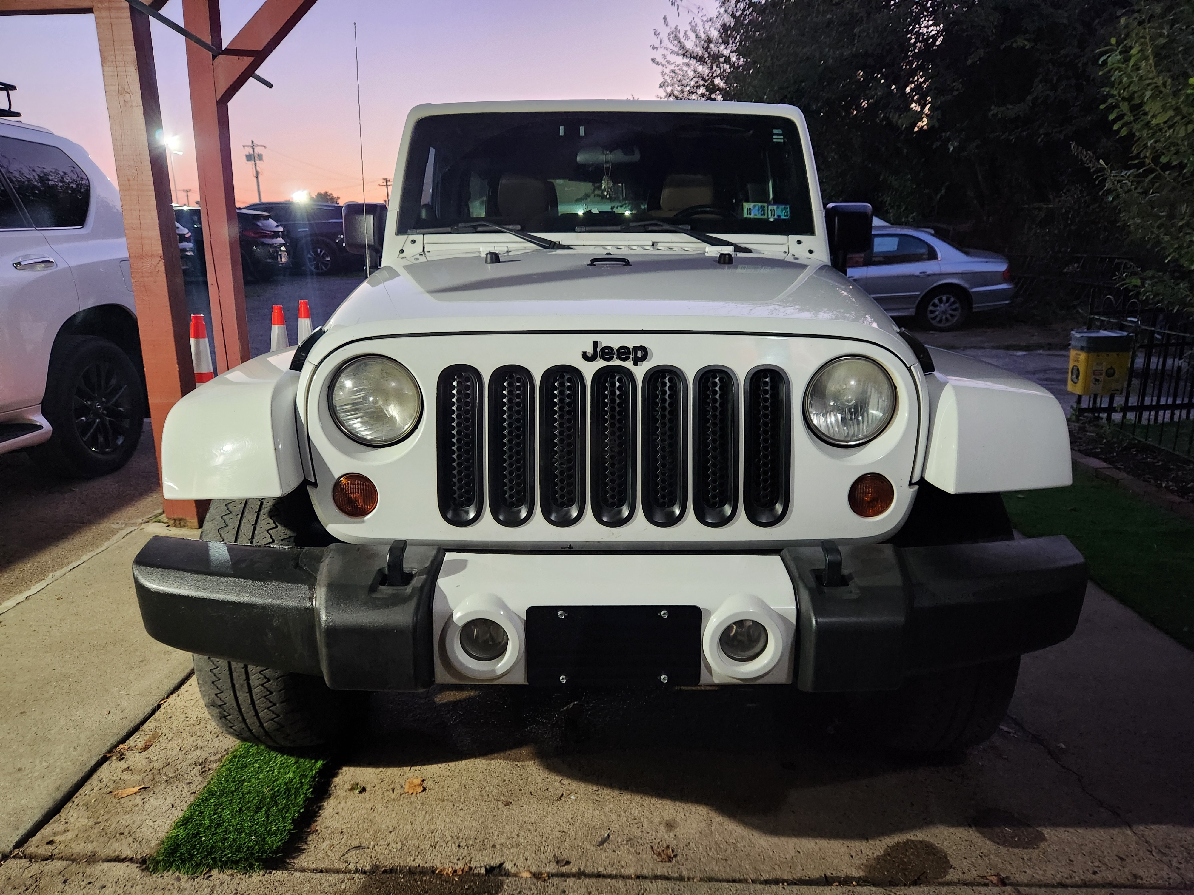 Used 2012 Jeep Wrangler Unlimited Sahara w/ Dual Top Group AWD/4WD image 13