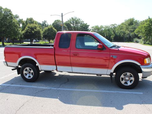 Used 1999 Ford F150 4x4 SuperCab image 1