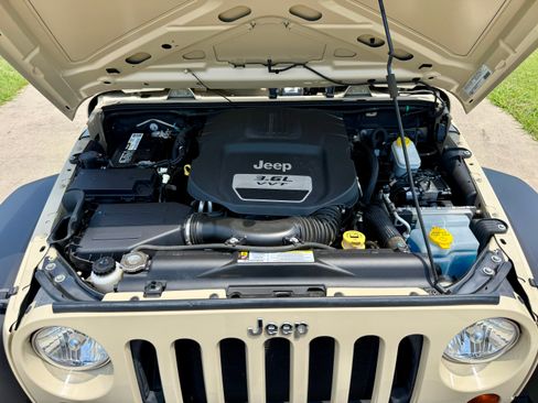 Used 2012 Jeep Wrangler Unlimited Sport AWD/4WD image 23