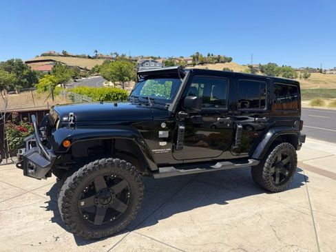 Used 2011 Jeep Wrangler Unlimited 70th Anniversary w/ Connectivity Group AWD/4WD image 1