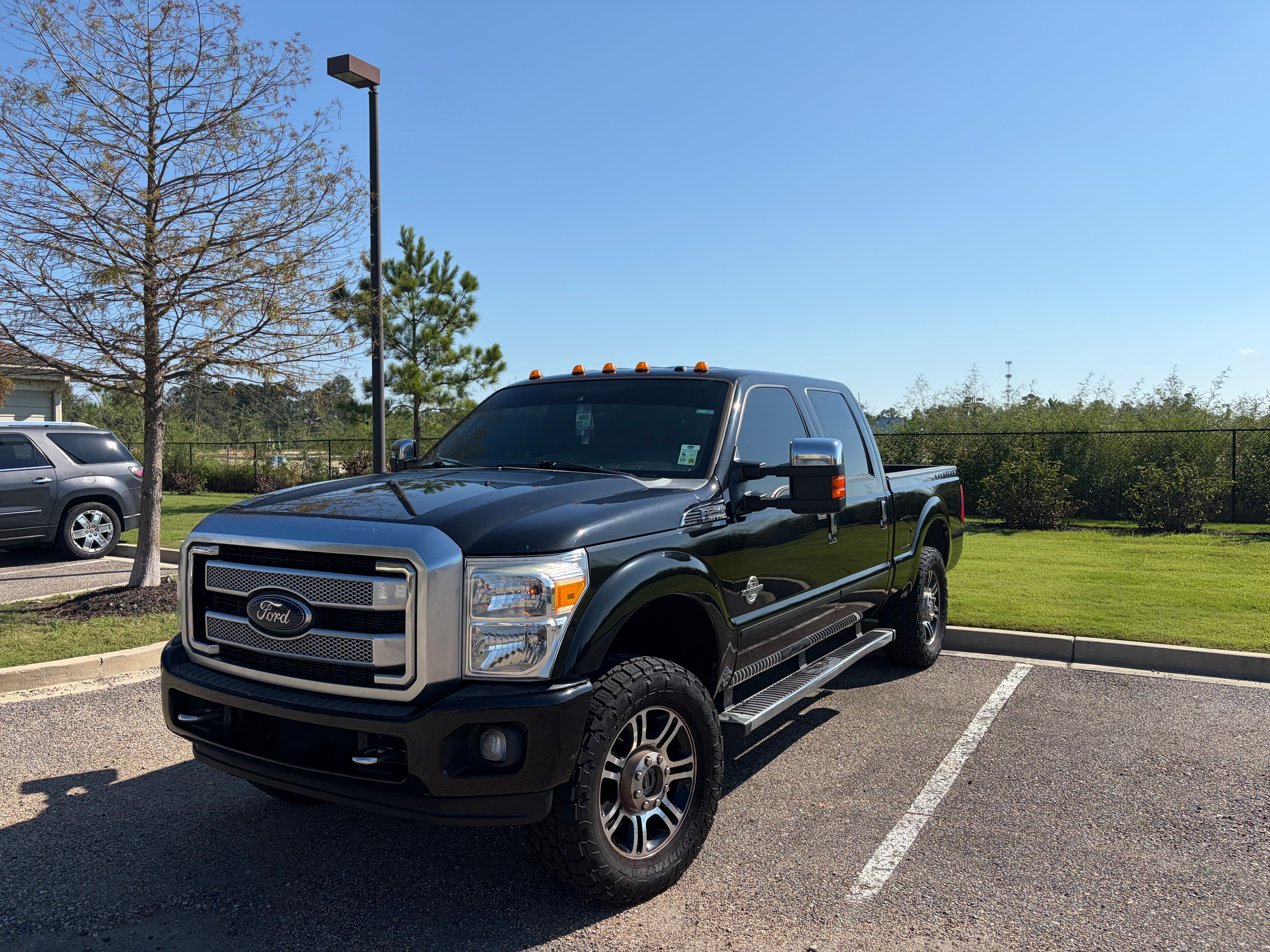 Used 2013 Ford F250 Platinum w/ FX4 Off Road Pkg AWD/4WD image 1