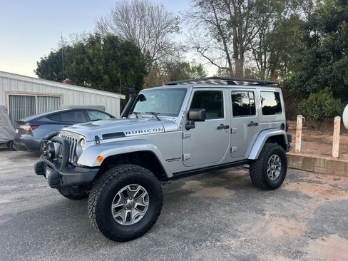 Used 2015 Jeep Wrangler Unlimited Rubicon w/ Dual Top Group AWD/4WD image 1