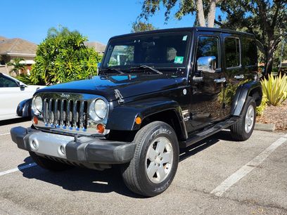 Used 2012 Jeep Wrangler Unlimited Sahara w/ Dual Top Group