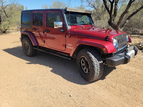 Used 2011 Jeep Wrangler Unlimited Sahara w/ Mopar Chrome Edition Group image 2