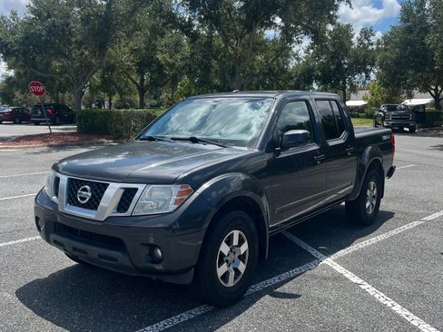 Used 2013 Nissan Frontier PRO-4X AWD/4WD image 1