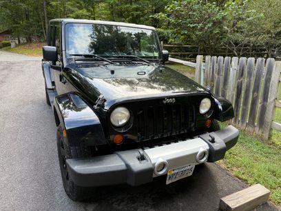 Used 2010 Jeep Wrangler Unlimited Sahara w/ Dual Top Group