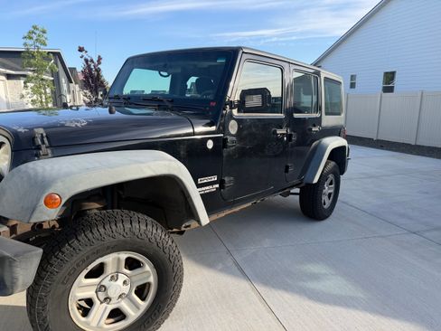 Used 2012 Jeep Wrangler Unlimited Sport AWD/4WD image 2