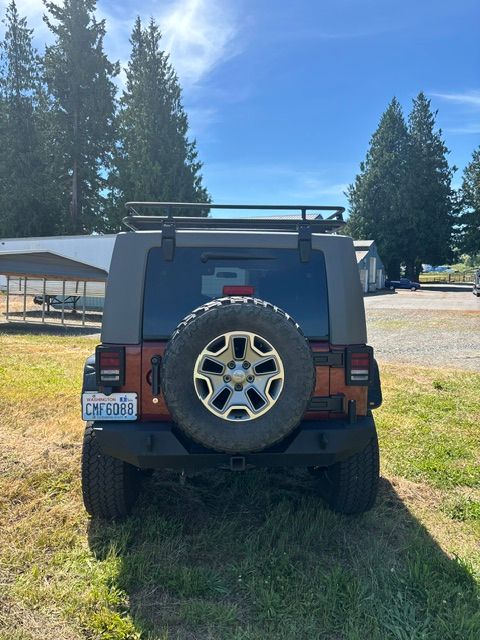 Used 2010 Jeep Wrangler Unlimited Sahara w/ Dual Top Group AWD/4WD image 8
