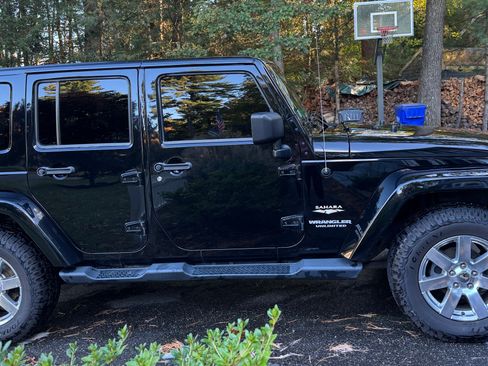 Used 2013 Jeep Wrangler Unlimited Sahara w/ Dual Top Group image 1