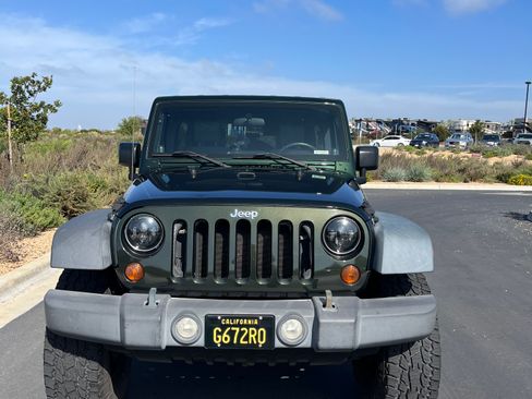 Used 2010 Jeep Wrangler Unlimited Sport image 1