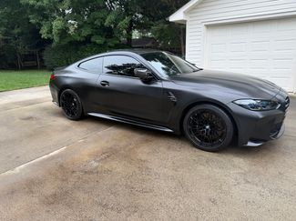 Used 2021 BMW M4 Coupe w/ M Carbon Exterior Package RWD video 1