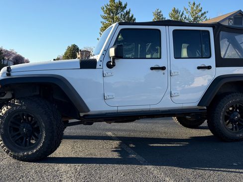 Used 2012 Jeep Wrangler Unlimited Sport w/ Black Appearance Group image 2