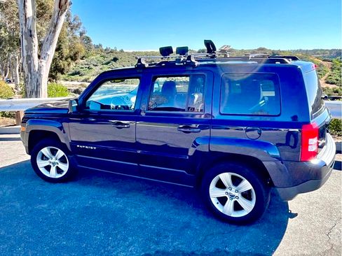Used 2014 Jeep Patriot Latitude w/ Sun/Sound Group AWD/4WD image 1