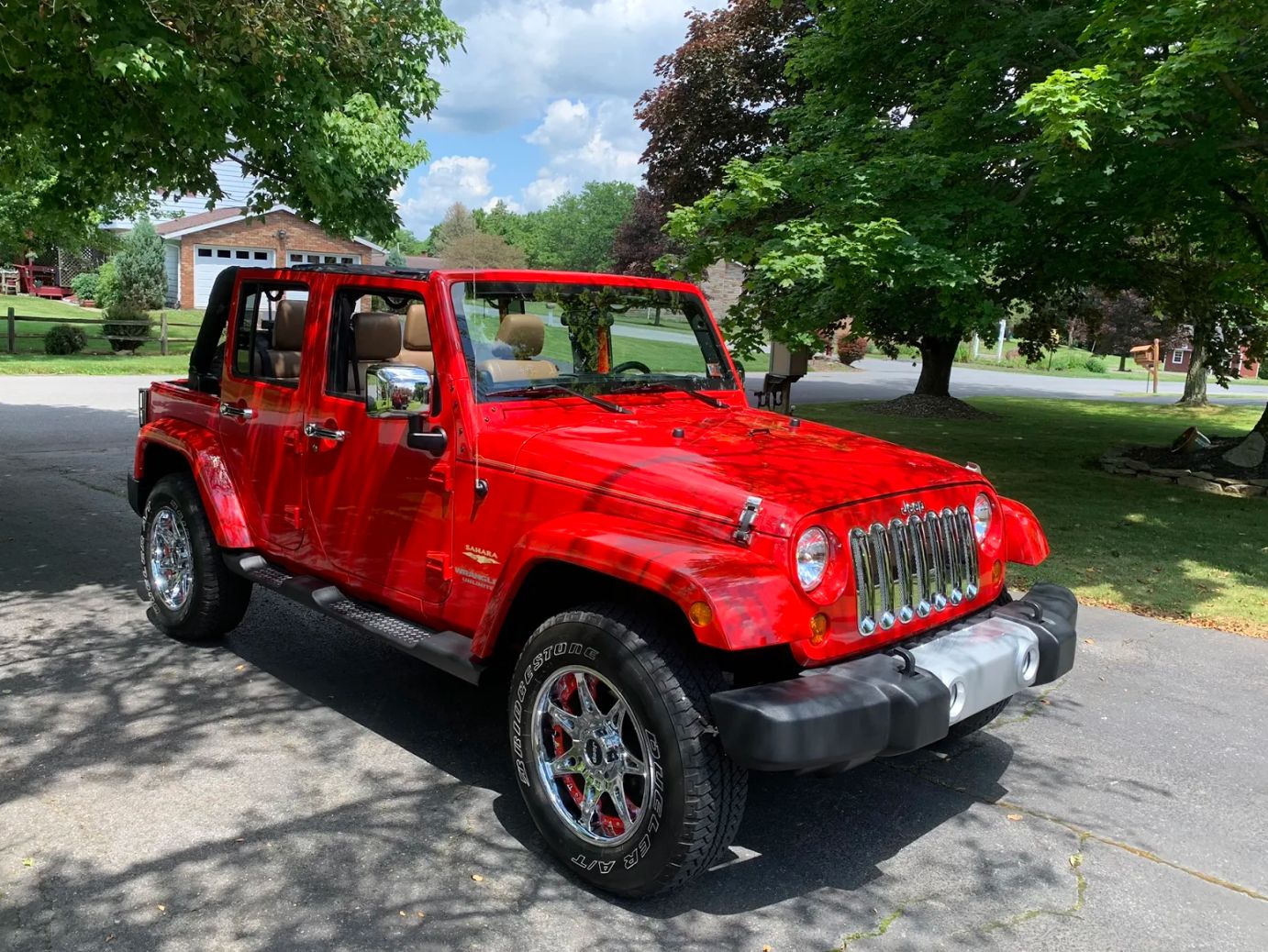 Used 2012 Jeep Wrangler Unlimited Sahara w/ Dual Top Group AWD/4WD image 1