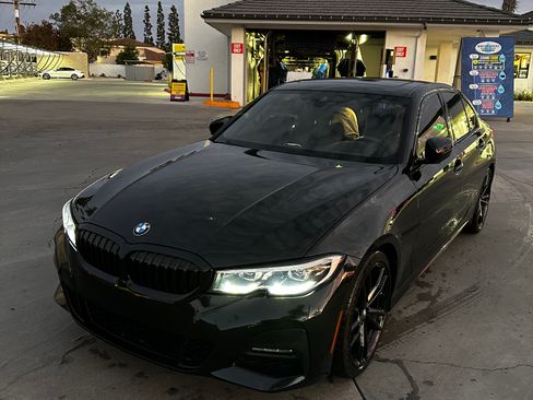 Used 2021 BMW 330i Sedan w/ M Sport Package image 1