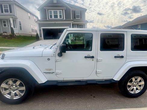 Used 2012 Jeep Wrangler Unlimited Sahara w/ Connectivity Group image 1