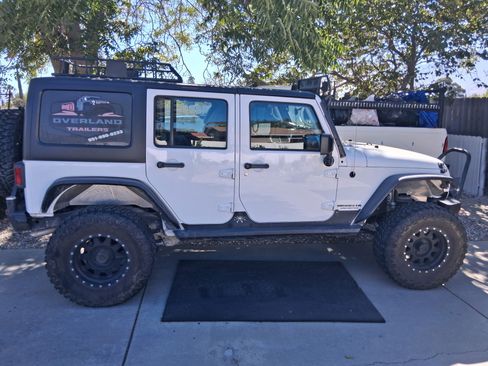 Used 2014 Jeep Wrangler Unlimited Sport AWD/4WD image 2