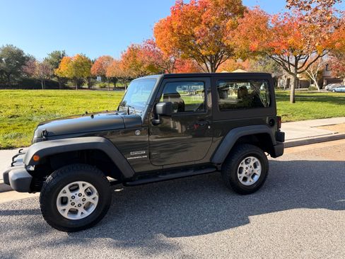 Used 2015 Jeep Wrangler Sport image 1