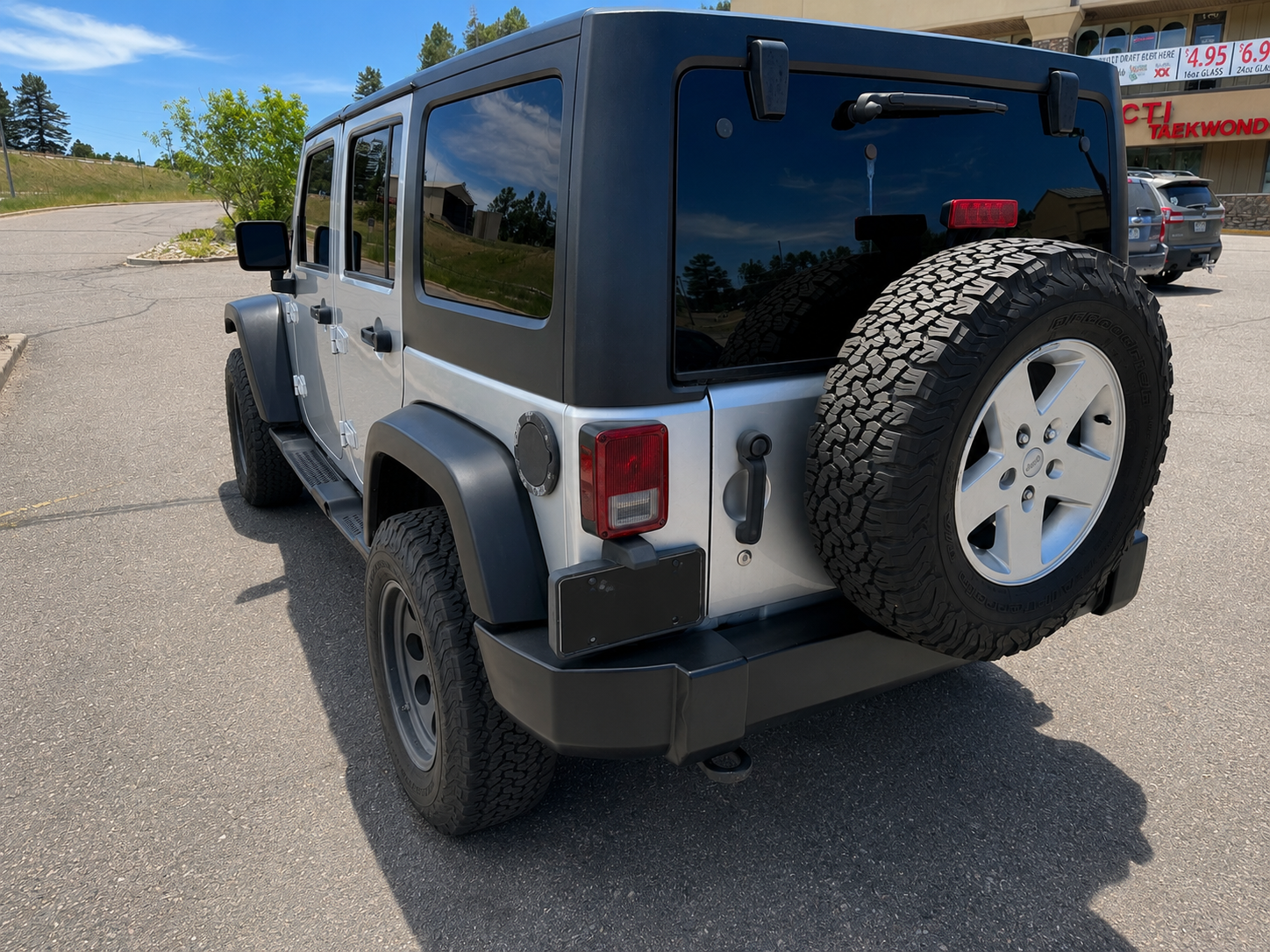 Used 2011 Jeep Wrangler Unlimited Sport AWD/4WD image 1