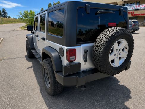 Used 2011 Jeep Wrangler Unlimited Sport AWD/4WD image 1