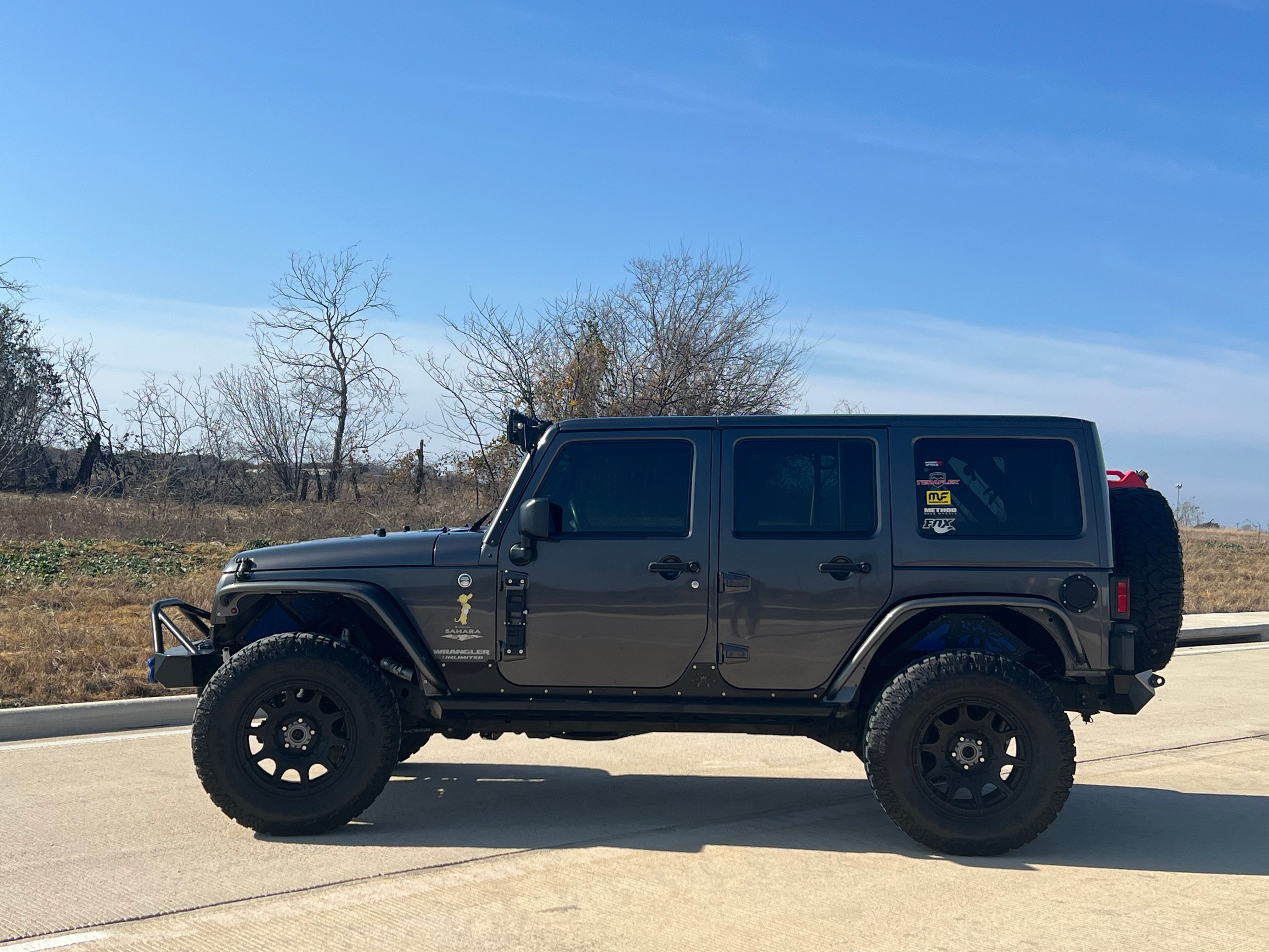 Used 2014 Jeep Wrangler Unlimited Sahara w/ Max Tow Package AWD/4WD image 1