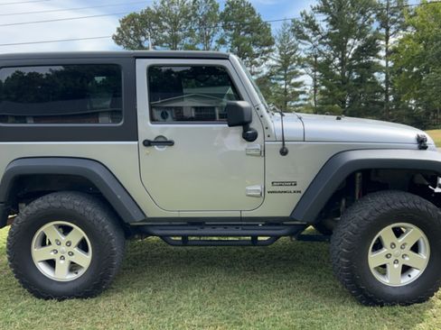 Used 2013 Jeep Wrangler Sport image 1