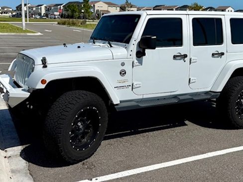 Used 2015 Jeep Wrangler Unlimited Sahara w/ Connectivity Group image 1