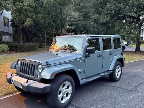 Used 2015 Jeep Wrangler Unlimited Sahara image 1