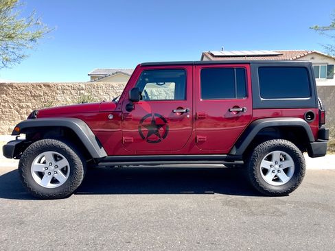Used 2011 Jeep Wrangler Unlimited Sport AWD/4WD image 1