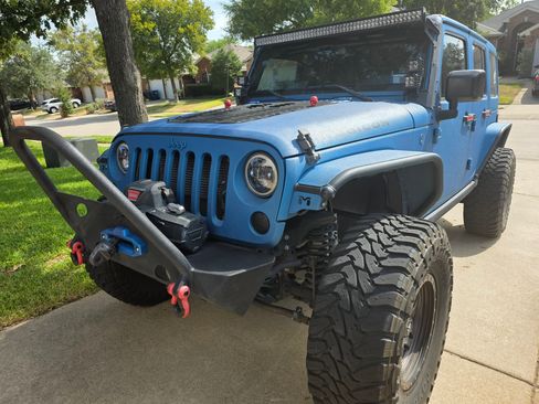 Used 2016 Jeep Wrangler Unlimited Rubicon w/ Connectivity Group AWD/4WD image 1
