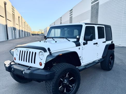Used 2013 Jeep Wrangler Unlimited Sport image 1