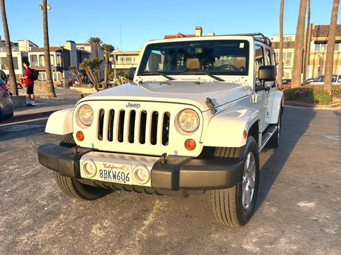 Used 2013 Jeep Wrangler Unlimited Sahara w/ Dual Top Group image 2
