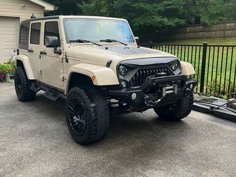 Used 2016 Jeep Wrangler Unlimited Sahara AWD/4WD image 1