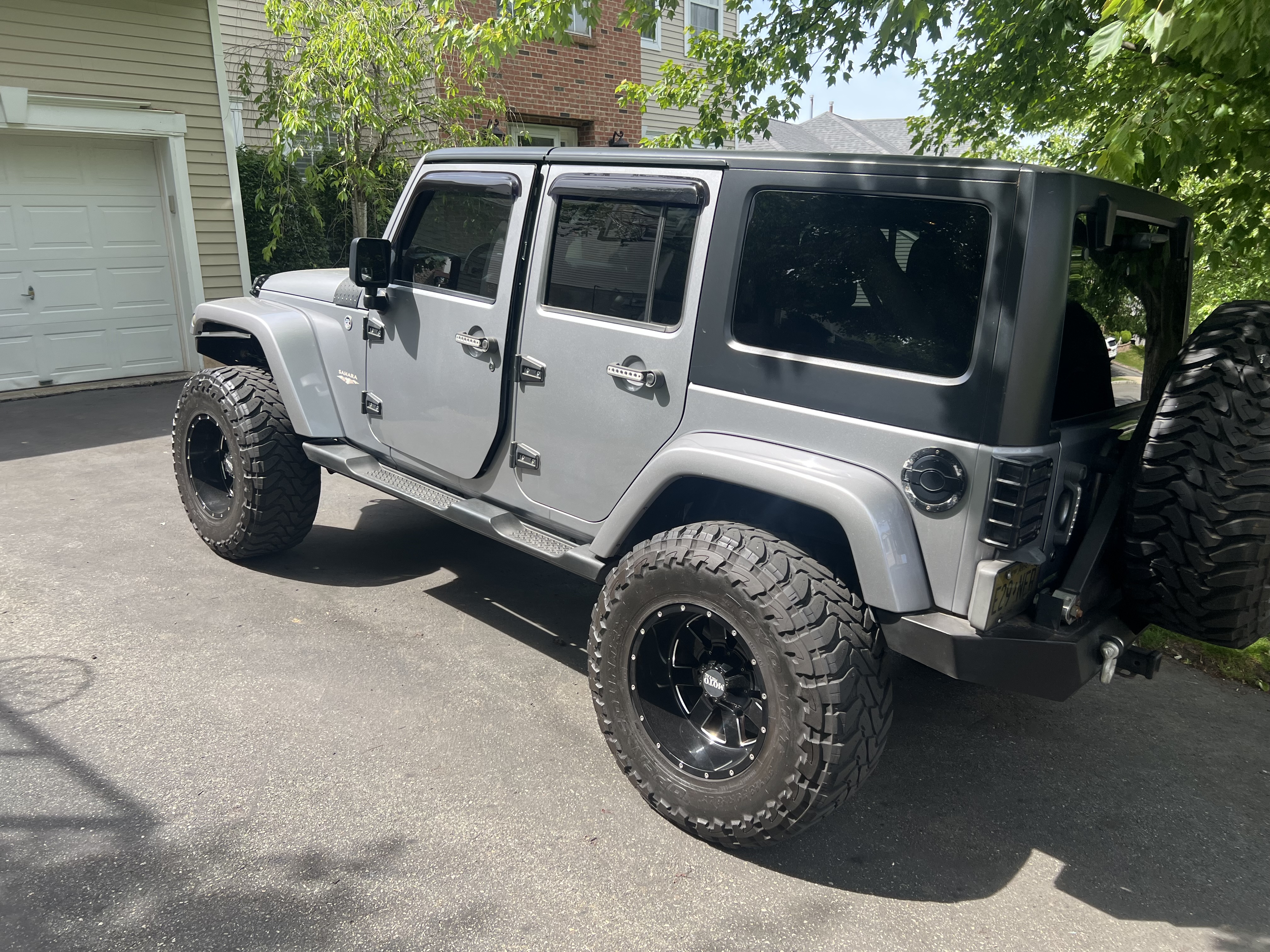 Used 2013 Jeep Wrangler Unlimited Sahara w/ Dual Top Group AWD/4WD image 11