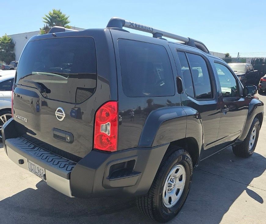Used 2013 Nissan Xterra X RWD image 2