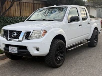Used 2012 Nissan Frontier SV w/ SV Premium Utility Pkg