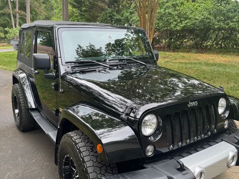 Used 2014 Jeep Wrangler Sahara w/ Connectivity Group AWD/4WD image 1