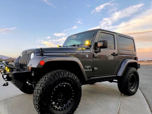 Used 2016 Jeep Wrangler Sahara w/ Connectivity Group AWD/4WD image 1
